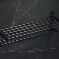 Modern Dark Metal Bathroom Towel Rack With Linear Bars Mounted On Marble Wall