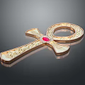 Elegant Golden Ankh Clothing Accessory Featuring Red Gemstone And Intricate Patterns