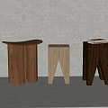 Various Wooden Stools With Curved Tops And Different Leg Designs Against Minimalist Gray Background