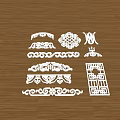 Ornate Wooden Decorative Carvings With Various Traditional Patterns And Shapes On Table
