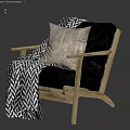 Black Leather Leisure Chair With Wooden Frame Beige Pillow And Chevron Blanket