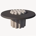 Round Dark Tabletop With White Dome Shaped Objects And Cylindrical Legs 3d model