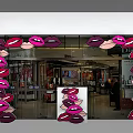 Eye Catching Door Arch With Red Lip Decorations At Retail Store Front