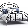 Black Metal Single Bed with Curved Frame White Patterned Linens and Navy Pillows