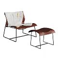 Brown Accent Chair with Metal Frame and White Blanket and Matching Ottoman