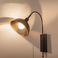 Modern Metal Chandelier With Curved Arm And Warm Lighting For Interior Decoration