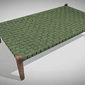 Single Bed With Green Woven Surface And Simple Wooden Legs Design