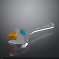 Adjustable Wrench With Orange Jaw Blue Spring White Handle And Reflection On Dark Surface