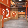 Hotpot Restaurant Interior Featuring Wooden Tables Benches Orange Walls Circular Decorations Warm Lighting Open Space