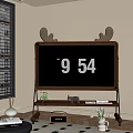Antler Decor Wooden Clock Showing Nine Fifty Four Time On Living Room Shelf With Plants