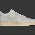 Nike White Classic Low Top Sneakers With Lace Up Closure And Beige Sole Design