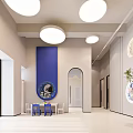 Kids Playroom with Blue Yellow Walls Astronaut Decor Round Windows White Table Chairs Building Blocks