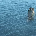 Luxury Yacht Sailing On Open Blue Sea Waters With Gentle Waves And Clear Horizon