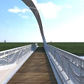 Modern White Streamlined Bridge Spanning Water With Green Grass Blue Sky And White Clouds
