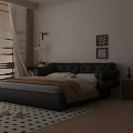 Black Leather Double Bed With Brown And Gray Blankets Bedside Tables Lamp And Wall Art