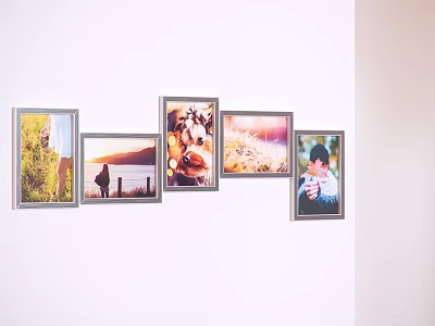 Wall Decor With Multiple Photo Frames Showing Different Scenery And People 3d model