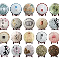 Round Tea Cakes With Various Patterns Displayed On Stands For Daily Use