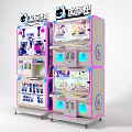 Pastel Pink And Blue Claw Machines With Transparent Windows For Toy Displays