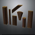 Wooden Logs From Trees In Various Shapes And Sizes On Dark Background