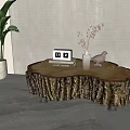 Natural Edge Wooden Coffee Table With Photo Frame Vase And Bird Decor