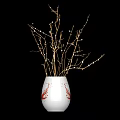 White Ceramic Vase With Red Patterns Holding Decorative Twigs And Small Beads
