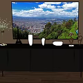 Modern Glossy Gray TV Stand With Large Screen TV Decorative Vases And Ornaments