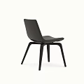 Black Leather Dining Chair With Modern Minimalist Design Ergonomic Backrest And Sleek Wooden Legs