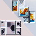 Multiple Framed Abstract Art Paintings With Colorful Designs Arranged On Wall