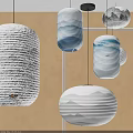 Decorative Paper Lanterns With Mountain Patterns Wave Designs And Small Boat Motifs Hanging