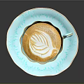 Light Blue Teacup and Saucer with Gold Floral Patterns Holding Latte with Swirl Art