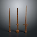 Three Ancient Wooden Weapons With Decorative Handles And Long Shafts