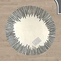 Round Rug with White Center Black Radiating Stripes on Light Wood Floor and Open Book