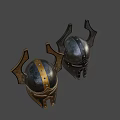 Two Horned Medieval Helmets With Golden And Silver Metal Decorative Design
