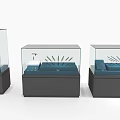 Modern Glass Display Cases With Black Bases Showcasing Exhibition Items