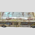 Dilapidated Rusted Old Bus With Faded Paint Broken Windows And Worn Exterior