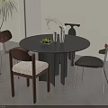 Round Black Table And Chairs Set With Fruits Vase And Indoor Plant On Wooden Floor