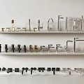 Various Faucets Displayed on White Shelves with Different Colors and Styles