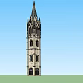Gothic Style Stone Tower With Pointed Spire Windows And Architectural Details Against Blue Sky