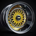 Stylish Automotive Tire Wheel Rim With Silver Outer Ring Yellow Center And Black Pattern Design