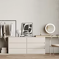 White Vanity With Clothing Rack Round Mirror Artwork And Chair On Wooden Floor