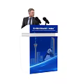 Speaker Addressing At Sichuan International Trade And Investment Fair Podium With Panda And City Design