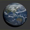 Globe of Earth Featuring Blue Oceans White Clouds Green Landmasses And Gray Background