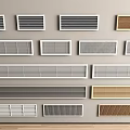 Collection of Various Air Conditioner Vents in Different Colors and Styles Arranged on Wall