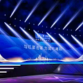 Bright Blue Stage Design With Star Patterns And City Silhouette For Mall Event