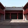 Ancient Chinese Architecture With Red Walls Black Roof Courtyard And Stone Path On Green Lawn