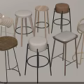 Assorted Modern Bar Stools With Wooden Seats Metal Frames And Fabric Cushions