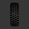 Truck Tire With Deep Tread Pattern And Metal Rim On Dark Background