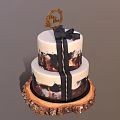Two Tiered Cake With Black White Drizzle Decorations And Top Ornament On Rustic Wooden Base