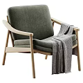 Modern Comfortable Green Accent Chair with Wooden Armrests and Gray Blanket
