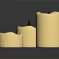 Set Of Three Cream Colored Household Candles With Various Shapes And Wicks